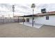 Covered patio with gravel, accessible through sliding glass doors at 6170 W University Ave, Las Vegas, NV 89103