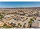 Property featuring an estate showcasing landscaping with decorative features and an impressive architectural design at 7025 N Eula St, Las Vegas, NV 89149