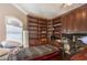 Bedroom with built-in shelving, desk, and space for sleeping at 7025 N Eula St, Las Vegas, NV 89149