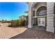 Elegant doorway with decorative glass and white trim on a brick paved drive at 7025 N Eula St, Las Vegas, NV 89149