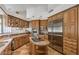 Spacious kitchen with granite countertops, modern stainless steel appliances, and large island at 7025 N Eula St, Las Vegas, NV 89149