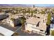 Beautiful aerial view showcases a sprawling community with desert scenery in the background at 7163 S Durango Dr # 303, Las Vegas, NV 89113