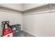 Walk-in closet with upper shelving and storage space for clothing and accessories at 7457 Onyx Star St, North Las Vegas, NV 89084