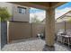 Cozy patio with neutral fence, column and paved flooring at 7457 Onyx Star St, North Las Vegas, NV 89084