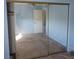 Bedroom with mirrored closet doors and ceiling fan at 746 Anne Ln, Henderson, NV 89015