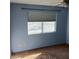 Bedroom featuring a window and ceiling fan at 746 Anne Ln, Henderson, NV 89015