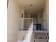 View of the entrance with steps and railing, leading to unit number 744 at 746 Anne Ln, Henderson, NV 89015