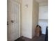 Entrance showing security gate and unit 744 with boxes near the door at 746 Anne Ln, Henderson, NV 89015