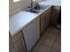 Kitchen showcasing an appliance, white countertops, and neutral cabinets at 746 Anne Ln, Henderson, NV 89015