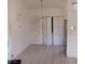 The kitchen features tile floors, neutral cabinets, and access to stainless steel refrigerator at 746 Anne Ln, Henderson, NV 89015