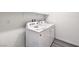 A functional laundry area featuring a washer and dryer set against a neutral wall at 9926 Ullom Dr # 4, Las Vegas, NV 89141
