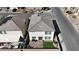 Aerial view of home, featuring a yard with turf and paver, play structure and neighborhood views at 10122 Mystic Falls Dr, Las Vegas, NV 89141