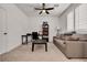 Bonus room featuring functional work space including a desk, seating, and plantation shutters at 10122 Mystic Falls Dr, Las Vegas, NV 89141