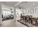 Spacious living area and formal dining area with lots of natural light and open concept design at 10122 Mystic Falls Dr, Las Vegas, NV 89141
