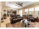 Spacious living room showcases an open floor plan, comfortable leather furniture, and elegant decor at 1013 Baronet Dr, Las Vegas, NV 89138