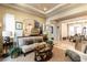 Open living room featuring stylish decor, comfortable seating, and view of the dining room at 1013 Baronet Dr, Las Vegas, NV 89138