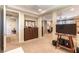 Spacious main bedroom featuring fireplace, seating area, and stylish decor at 1013 Baronet Dr, Las Vegas, NV 89138