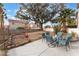 Spacious backyard featuring a patio with table and chairs at 1017 Cliffbrook Hedge Ave, North Las Vegas, NV 89081