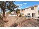 View of backyard featuring a patio area with chairs at 1017 Cliffbrook Hedge Ave, North Las Vegas, NV 89081