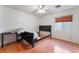 Bedroom featuring natural light, wood floors, ceiling fan at 1017 Cliffbrook Hedge Ave, North Las Vegas, NV 89081
