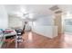 Spacious upstairs area with hardwood floors, ceiling fan, and ample natural light at 1017 Cliffbrook Hedge Ave, North Las Vegas, NV 89081