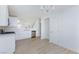 Bright kitchen with stainless steel appliances, white cabinets, and modern lighting at 1021 Gary Carmena Ave, North Las Vegas, NV 89081