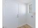 An interior laundry room with washer hookups and a door to the outside at 1021 Gary Carmena Ave, North Las Vegas, NV 89081