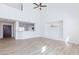 Open concept living room featuring light wood floors and plenty of natural light at 1021 Gary Carmena Ave, North Las Vegas, NV 89081