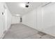 Spacious garage with ample storage space and an automatic door opener at 10510 Mojave Ridge Ct, Las Vegas, NV 89183