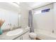 Bathroom featuring a shower and bathtub, a toilet, and sink with granite countertop at 124 Beach Oak Ave, Henderson, NV 89002