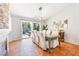 Dining room features large dining table, tile flooring, and fireplace at 124 Beach Oak Ave, Henderson, NV 89002