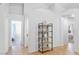 Hallway showcases tile flooring, neutral walls, and a decorative shelf at 124 Beach Oak Ave, Henderson, NV 89002