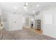 Spacious living room boasting neutral decor, recessed lighting, and access to other rooms at 124 Beach Oak Ave, Henderson, NV 89002