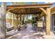 Covered patio with a full outdoor kitchen and dining and seating area, perfect for entertaining at 124 Beach Oak Ave, Henderson, NV 89002