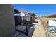 A screened-in gazebo offers a private outdoor living space next to the house at 1309 Exley Ave, Las Vegas, NV 89104