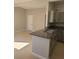 Updated kitchen with modern gray cabinets and a peninsula island at 1309 Exley Ave, Las Vegas, NV 89104