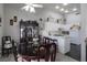 Open-concept dining room features white cabinets and marble countertops at 1312 Georgia Ave # D, Boulder City, NV 89005
