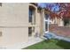 Exterior view of the home with well-maintained lawn, showcasing the architecture and outdoor space at 1312 Georgia Ave # D, Boulder City, NV 89005