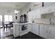 Cozy kitchen with a gas stove, dining area, and natural light for comfortable living and dining at 1312 Georgia Ave # D, Boulder City, NV 89005