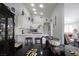 Open-concept kitchen features white cabinets and marble countertops at 1312 Georgia Ave # D, Boulder City, NV 89005