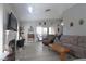 Inviting living room featuring neutral walls, hardwood floors, fireplace, and cozy furniture at 1312 Georgia Ave # D, Boulder City, NV 89005
