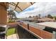 Balcony view of parking and neighboring building, complemented by a partial view of turf at 1312 Georgia Ave # D, Boulder City, NV 89005