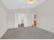 Bright bedroom with carpeted floors, neutral walls, and a ceiling fan, with doors leading to other rooms at 1326 Winter Solstice Ave, Henderson, NV 89014