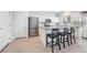 Bright kitchen with stainless steel appliances, white cabinets, and granite countertops at 2071 Idaho St, Pahrump, NV 89048