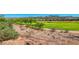 Expansive backyard with views of mature trees and golf course at 21 Via Visione # 101, Henderson, NV 89011