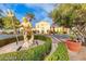Sculpture in a garden setting, enhancing the curb appeal of this luxurious community at 21 Via Visione # 101, Henderson, NV 89011