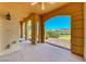 Covered patio with decorative columns showcasing scenic views of landscaping and mountains at 21 Via Visione # 101, Henderson, NV 89011
