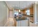 Well-equipped kitchen with stainless steel appliances and granite countertops at 21 Via Visione # 101, Henderson, NV 89011