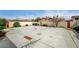 Spacious backyard featuring a large concrete area, perfect for entertaining or future customization at 2308 Avery Dr, Las Vegas, NV 89108