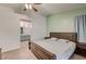 Bedroom featuring wood-look floors and en-suite bathroom at 2308 Avery Dr, Las Vegas, NV 89108